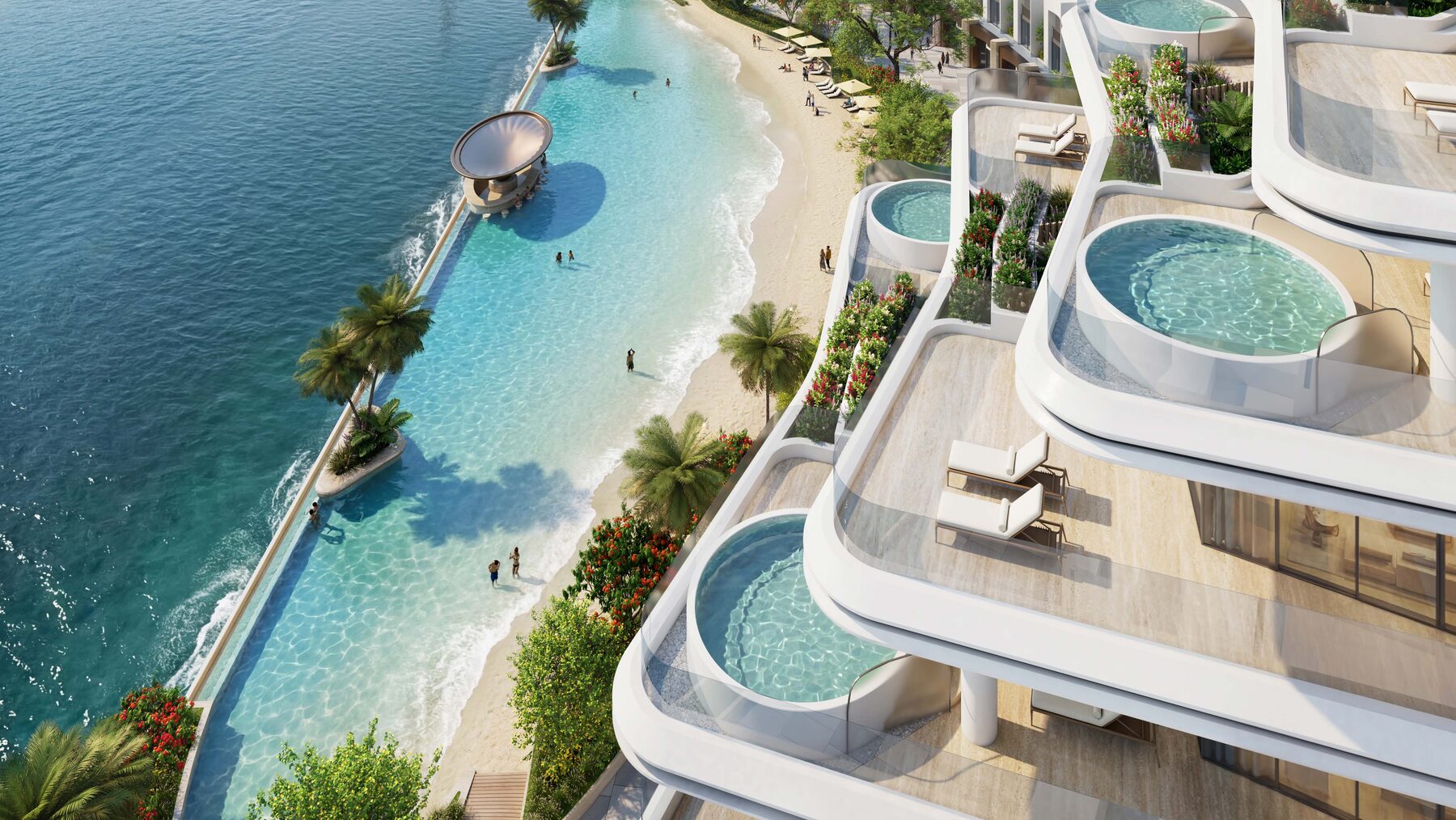 Aerial of beachfront lagoon pools and tower terraces with private plunge pools